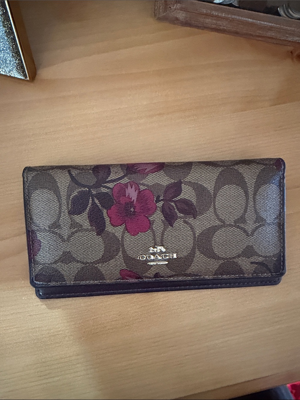 COACH Brown Signature Floral Continental Wallet with Pink Accents